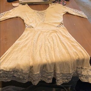 Cream dress, knee length